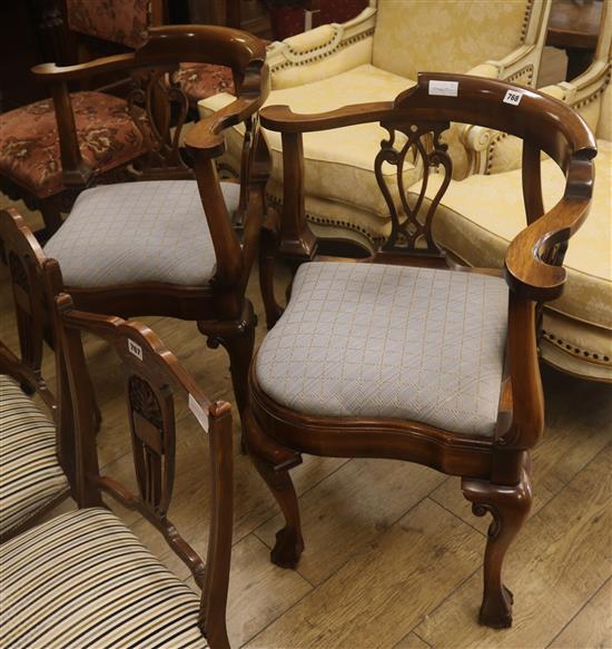 A pair of reproduction mahogany corner chairs